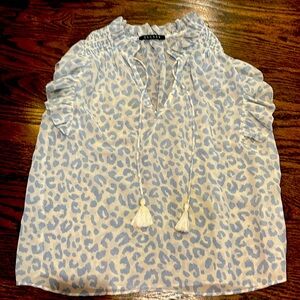 Sheer blouse with leopard print